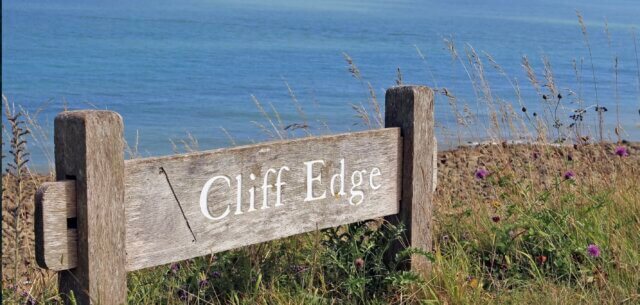 Comfortably miserable on the cliff edge