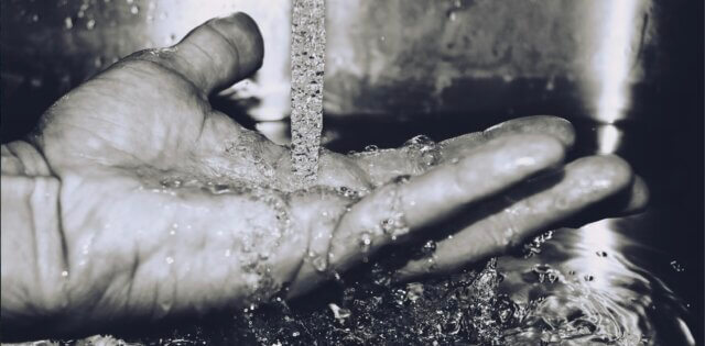 water splashes on hand